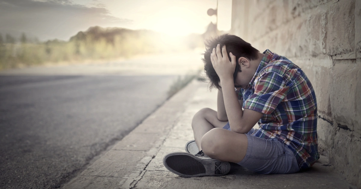 a little boy sad