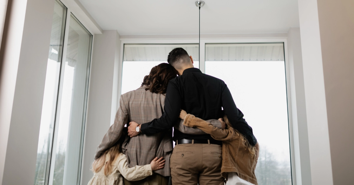 Two family members holding each other.